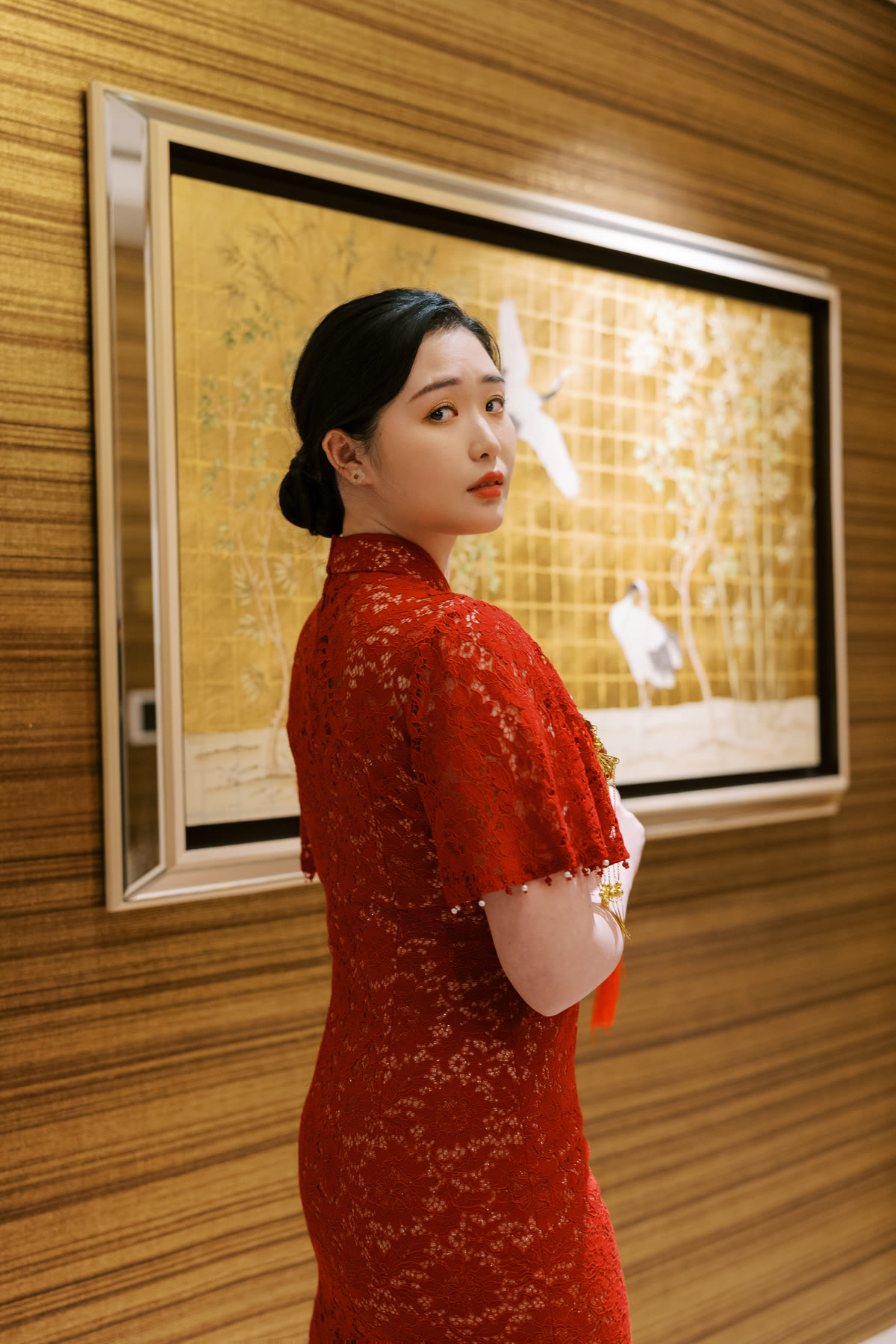 Jingting Xie wearing a red qipao